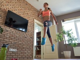 Woman doing cardio at home