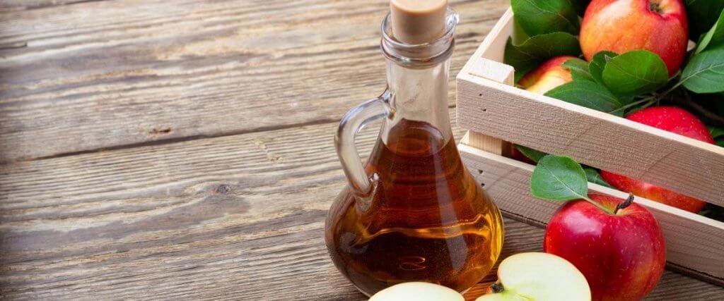 Apple Cider Vinegar with apples