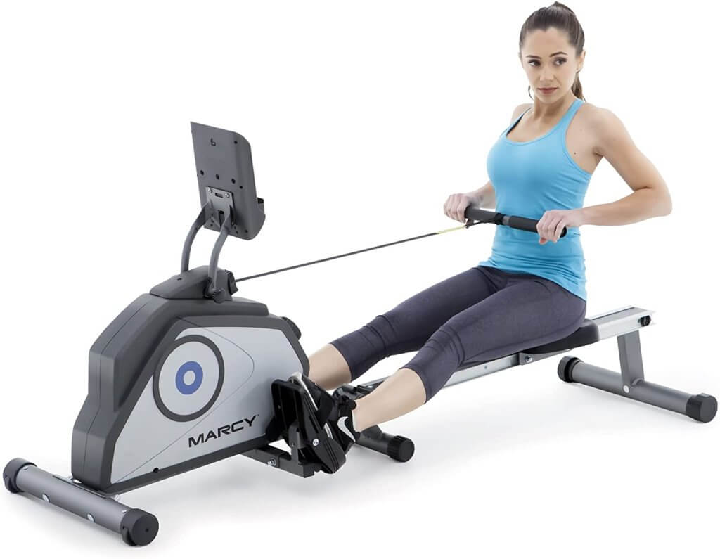 woman using Marcy Foldable Rowing Machine